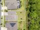 Aerial view of the property showing the backyard, surrounding homes, and green space at 9426 Launch Point Rd, Orlando, FL 32832