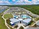 Community aerial view showcasing pool, pavilion, residences and common areas, with beautiful landscaping at 9426 Launch Point Rd, Orlando, FL 32832