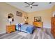 Cozy bedroom with warm lighting, stylish decor, and comfortable furnishings for a relaxing retreat at 9426 Launch Point Rd, Orlando, FL 32832