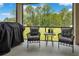 Outdoor patio features comfortable seating area overlooking a lush green landscape at 9426 Launch Point Rd, Orlando, FL 32832