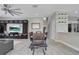 Modern dining area with built-in entertainment center at 9846 Palmetto Dunes Ct, Orlando, FL 32832