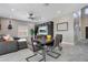 Open-concept living space with dining area, featuring modern decor and natural light at 9846 Palmetto Dunes Ct, Orlando, FL 32832