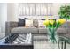 Elegant living room featuring a stylish sofa and a chess set at 9846 Palmetto Dunes Ct, Orlando, FL 32832