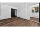 Bedroom with white walls and vinyl flooring with a window at 1257 N Pine Hills Rd, Orlando, FL 32808