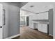 Functional kitchen space with white cabinets, hardwood floors, and a sink at 1257 N Pine Hills Rd, Orlando, FL 32808