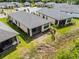 Overhead shot of the property showcasing the screened-in patio and surrounding neighborhood at 1388 Lombardi Ct, Kissimmee, FL 34759