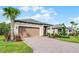 Attractive single-Gathering home with a spacious garage and brick paved driveway at 1388 Lombardi Ct, Kissimmee, FL 34759