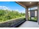 Enjoy the backyard view from this screened patio with sliding doors at 1388 Lombardi Ct, Kissimmee, FL 34759