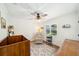 Welcoming Bedroom with hardwood floors, neutral color palette, a ceiling fan, and natural light at 2114 Geigel Ct, Orlando, FL 32806