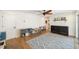 Bright living room featuring hardwood floors, cube storage, and tasteful decor, with lots of natural light at 2114 Geigel Ct, Orlando, FL 32806