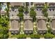 Aerial view of townhomes with neatly manicured landscaping and private walkways at 2280 San Vital Dr # 101, Kissimmee, FL 34741