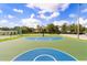 Outdoor community basketball court on a sunny day at 2280 San Vital Dr # 101, Kissimmee, FL 34741