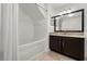 Bright bathroom with vanity and a soaking tub at 2280 San Vital Dr # 101, Kissimmee, FL 34741