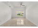 Sunlit living room showcases ceramic tile floors and a large window at 2280 San Vital Dr # 101, Kissimmee, FL 34741