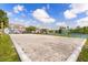 A beach volleyball court surrounded by the community's sports facilities at 2280 San Vital Dr # 101, Kissimmee, FL 34741