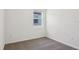 Bedroom features neutral carpet, natural light from window, and neutral walls at 2365 White Tail St, Davenport, FL 33837