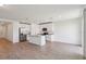 Modern kitchen with a center island, stainless steel appliances, and plenty of counter space for cooking at 2365 White Tail St, Davenport, FL 33837