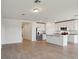 Spacious kitchen featuring stainless steel appliances, a center island, and ample cabinet space at 2365 White Tail St, Davenport, FL 33837