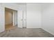 Bright bedroom with carpet and entrance to additional room at 24401 Sunnys Halo Way, Sorrento, FL 32776