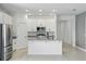 Open concept kitchen with island, granite countertops, and stainless steel appliances at 24401 Sunnys Halo Way, Sorrento, FL 32776