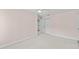 Cozy bedroom with neutral carpet, walk-in closet, and doorway to hall at 2592 Westminster Ter, Oviedo, FL 32765
