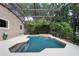 Private screened swimming pool, perfect for relaxation and outdoor enjoyment in a serene setting at 2592 Westminster Ter, Oviedo, FL 32765
