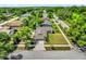 Aerial view of a single story home with mature trees and a driveway at 2601 Telstar Ave, Orlando, FL 32805