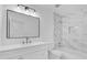 Contemporary bathroom with marble tiled shower and modern vanity at 2601 Telstar Ave, Orlando, FL 32805