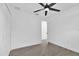 Bright bedroom featuring modern ceiling fan, and spacious closet at 2601 Telstar Ave, Orlando, FL 32805