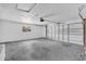 Spacious two car garage with automatic door opener and sealed concrete flooring at 2601 Telstar Ave, Orlando, FL 32805