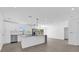 Modern kitchen featuring stainless steel appliances, granite countertops, and an open layout at 2601 Telstar Ave, Orlando, FL 32805
