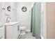 Bathroom with modern vanity and sink, and a coordinated shower curtain at 2926 Carriage Dr, South Daytona, FL 32119