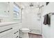 Beautiful bathroom featuring a spacious glass shower and a white vanity at 2926 Carriage Dr, South Daytona, FL 32119