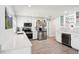 Well-lit kitchen boasts sleek countertops, stainless steel appliances, and a convenient wine cooler for modern living at 2926 Carriage Dr, South Daytona, FL 32119