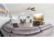 Open-concept living room with tile floors, comfortable seating, dining area, and modern décor at 2926 Carriage Dr, South Daytona, FL 32119