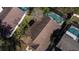 Aerial view of the property highlighting the backyard pool and surrounding trees at 3013 Barrymore Ct, Orlando, FL 32835