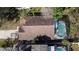Home aerial showcasing roof and the pool area at 3013 Barrymore Ct, Orlando, FL 32835