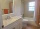 Bathroom with a bathtub, shower, tile floors, and a white vanity with modern hardware at 3013 Barrymore Ct, Orlando, FL 32835