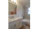 Bright bathroom featuring a marble countertop vanity and shower-tub combo at 3013 Barrymore Ct, Orlando, FL 32835