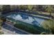 Aerial view of the fenced community tennis court, close to parking at 3013 Barrymore Ct, Orlando, FL 32835