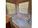 Bathtub with jets and faucet at 3807 Plantation Blvd, Leesburg, FL 34748
