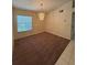 Carpeted dining room featuring chandelier lighting at 3807 Plantation Blvd, Leesburg, FL 34748