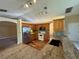 Bright kitchen featuring granite countertops, wood cabinets and stainless steel appliances at 3807 Plantation Blvd, Leesburg, FL 34748