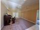Spacious living room with carpeted floors, high ceilings, and sliding glass doors leading to outdoor area at 3807 Plantation Blvd, Leesburg, FL 34748