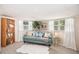 Comfortable living room with plush seating, soft lighting, and shelving for books and decor at 4106 Alverado St, Orlando, FL 32812