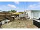 Inviting backyard with grill, dining and seating area beneath the shade for outdoor relaxation at 4629 Spottswood Dr, Orlando, FL 32812