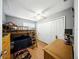 Bedroom featuring a bunk bed, wood flooring, a ceiling fan, and closet space at 4629 Spottswood Dr, Orlando, FL 32812