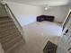 Inviting living room with tiled floors, staircase, and comfortable seating area at 5288 Cypress Ct # 439, Orlando, FL 32811