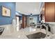 Bright kitchen boasts granite countertops, stainless steel appliances, and ample cabinet space at 5365 Rocking Horse Pl, Oviedo, FL 32765