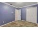 Bedroom featuring tile floors, doors and closet at 540 W Columbia St, Lake Alfred, FL 33850